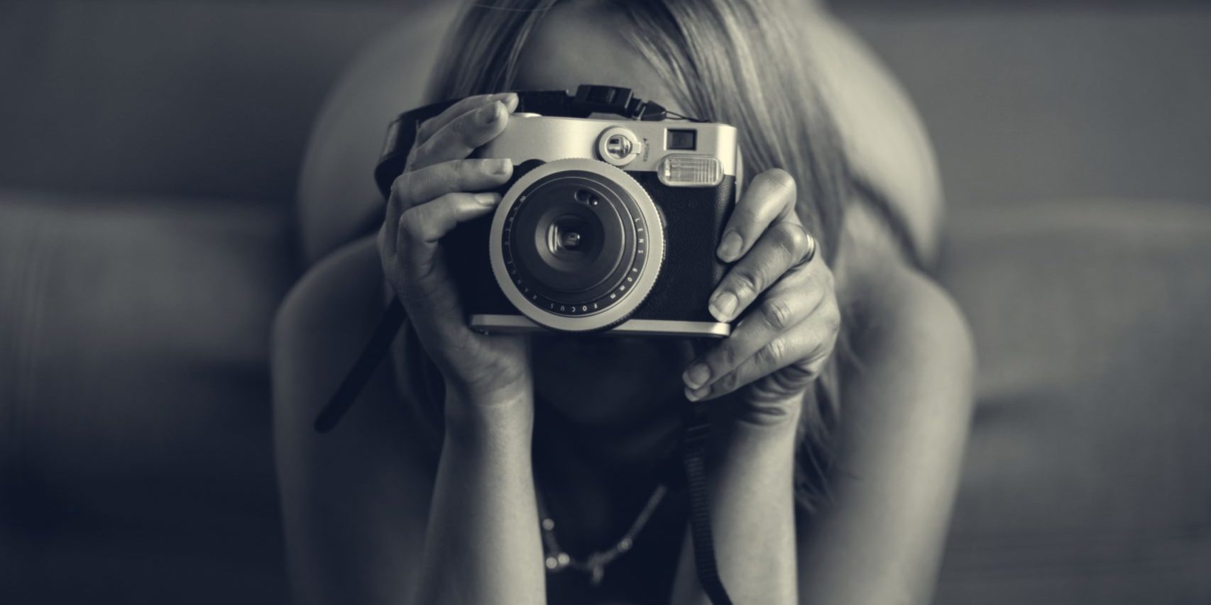 The,Lady,Taking,A,Picture,With,The,Camera