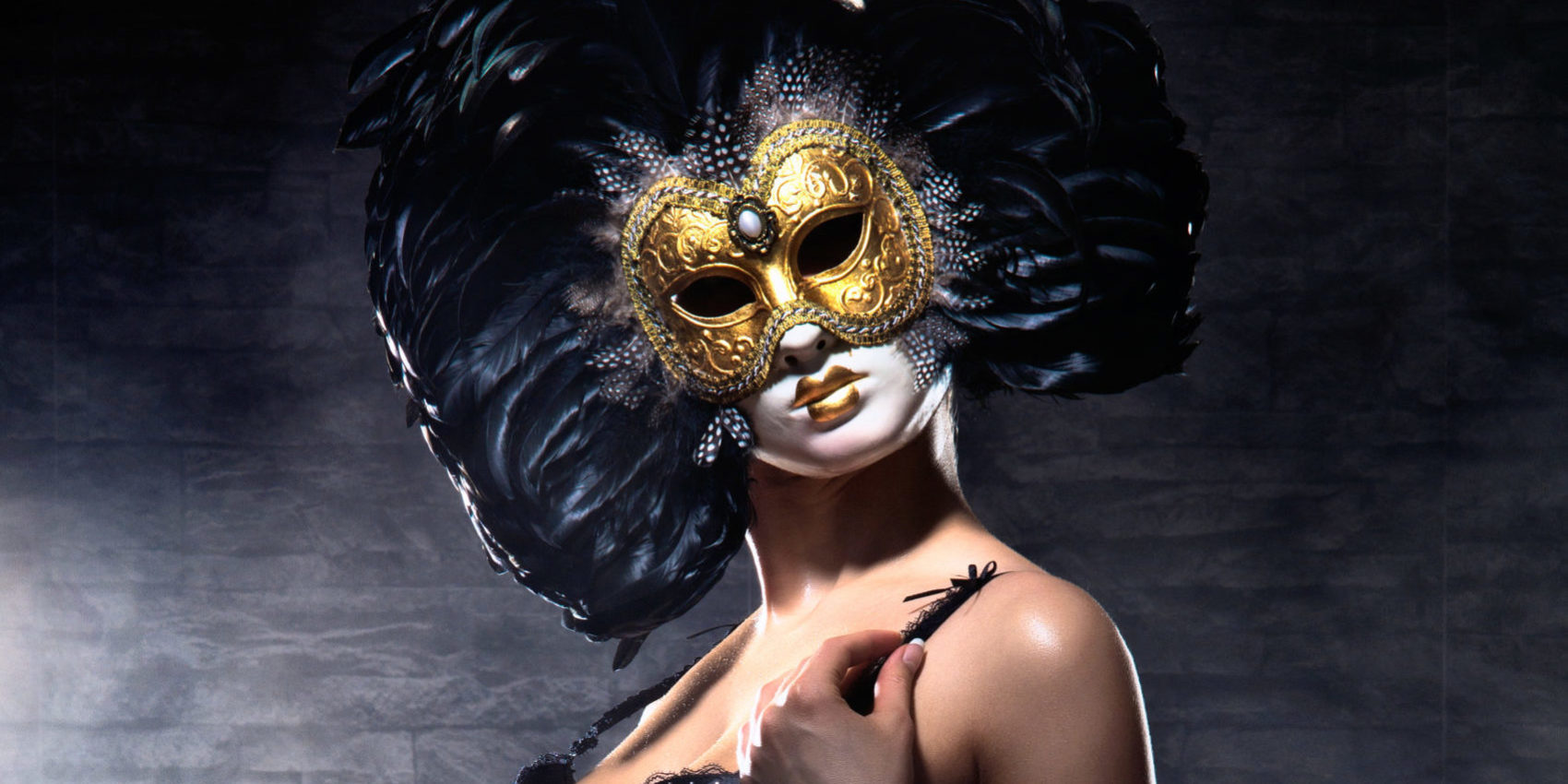 Young,Attractive,Woman,In,Mask,Over,Dark,Background
